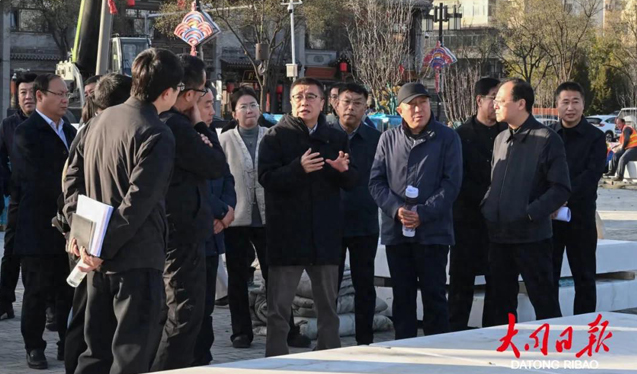 張強深入古城調研